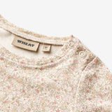 Wheat Main Kortermet kjole Johanna | Baby Dresses 1250 cream flower meadow