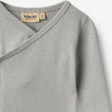 Wheat Main Omslagsbody Pil Body 1024 slightly blue
